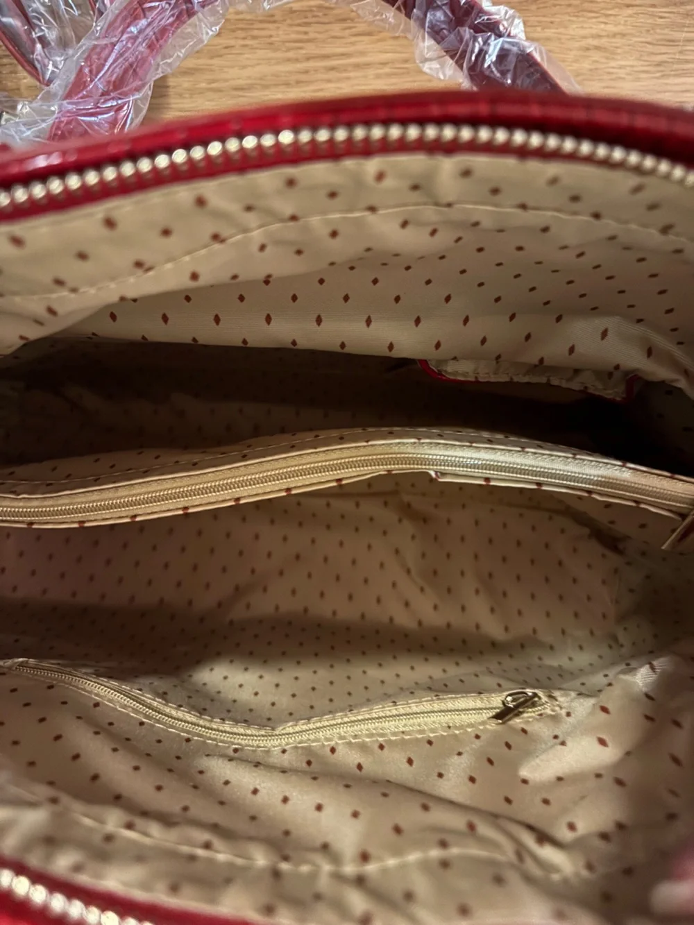 Vanessa Williams Lush round satchel vibrant red crocodile-embossed faux leather